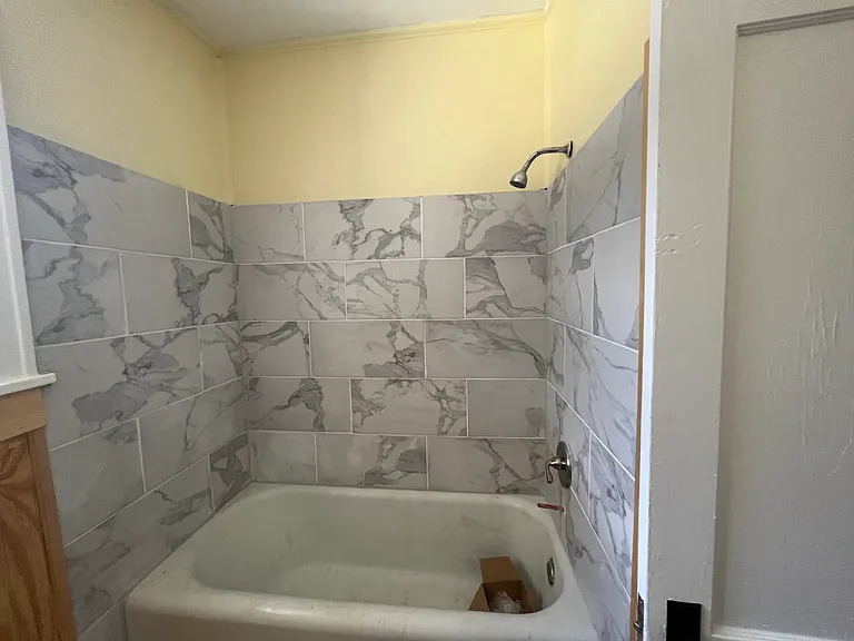 Tile Bathtub surround.