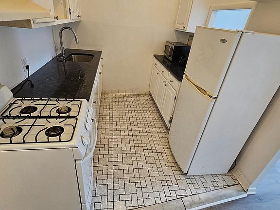 Kitchen (new countertops, sink and faucet)