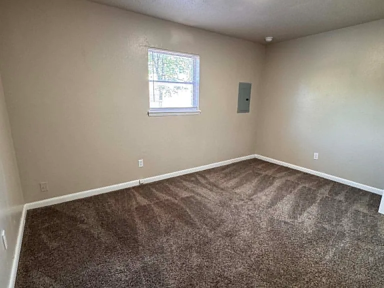 looking into bedroom from hallway.