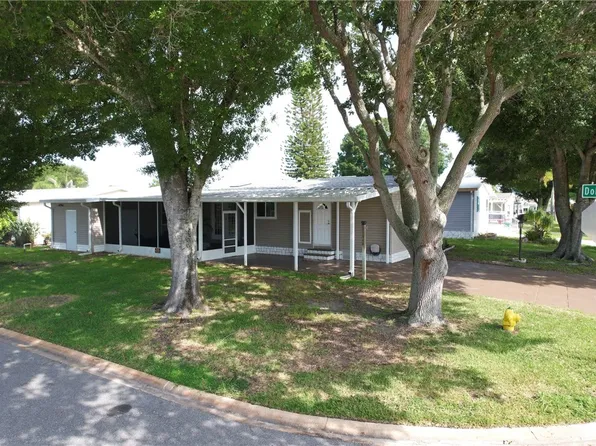 624 Dolphin Cir, Barefoot Bay, FL 32976