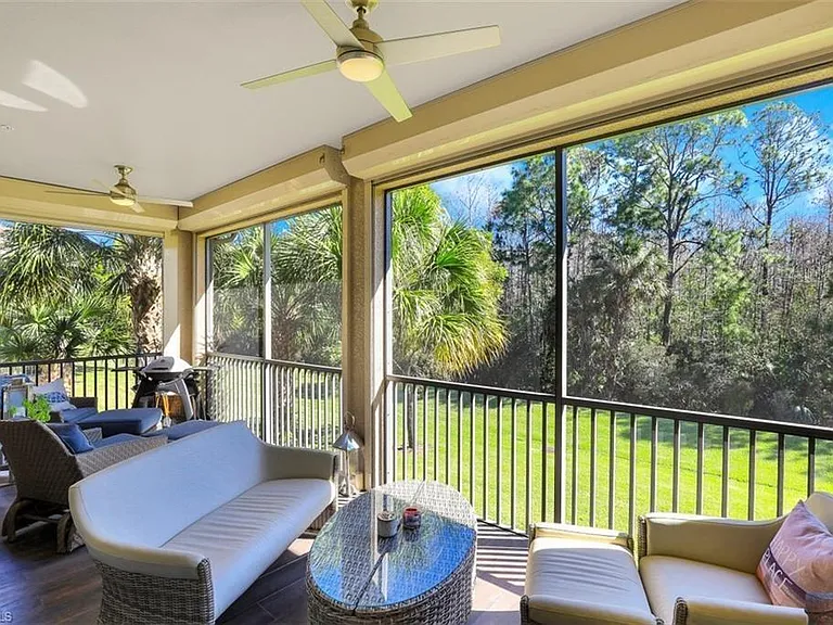 East facing screened in lanai overlooks the pristine preserves. Enjoy your morning coffee or unwind in the evening with your favorite drink.