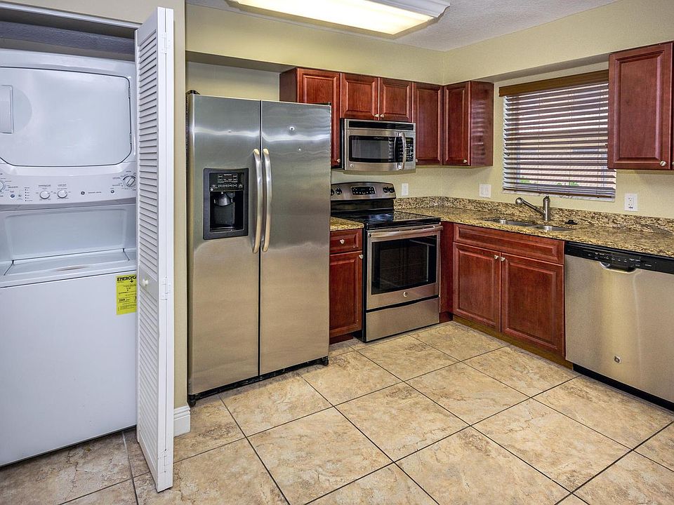 Full spacious kitchen with w/d, dishwasher, microwave, range and fridge. Windows overlook river.
