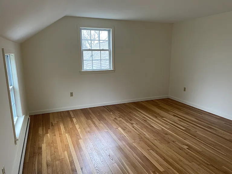 Looking into master bedroom toward side