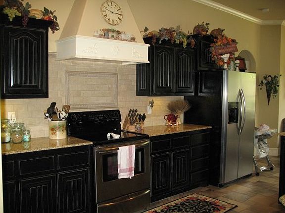 Granite kitchen with stainless appliances