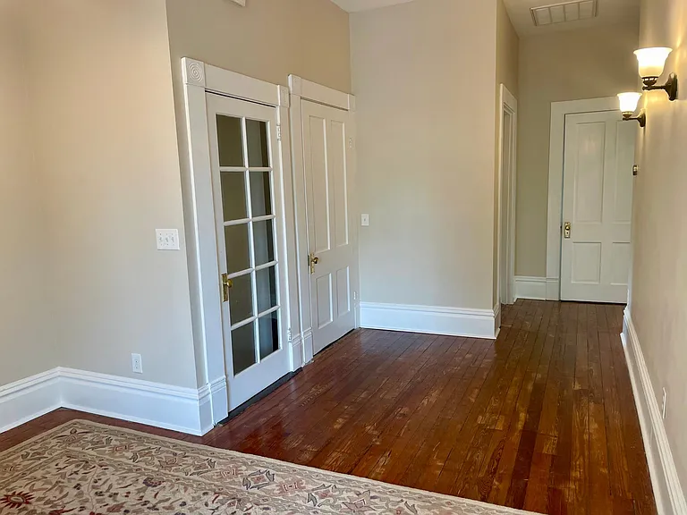 Hall to back bedroom, bathroom and kitchen