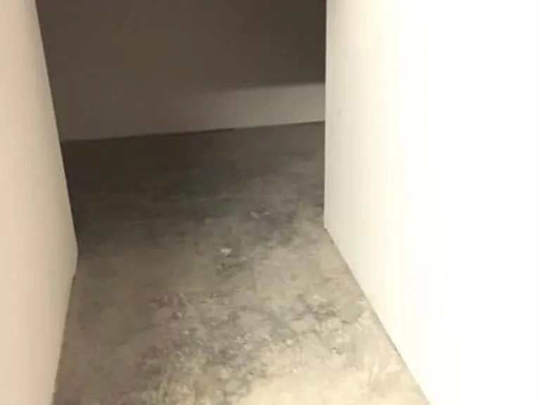 Storage under stairs and under entryway