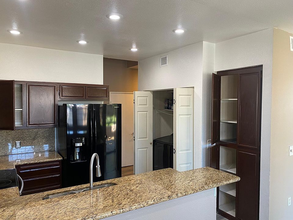 Pantry and expanded storage neighbor the in-unit washer & dryer