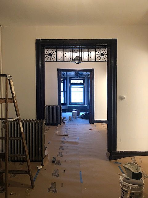 View from dining room, through living room, into front room.