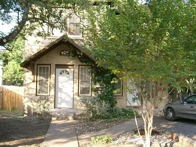 Front of unit, entrance is door on the left