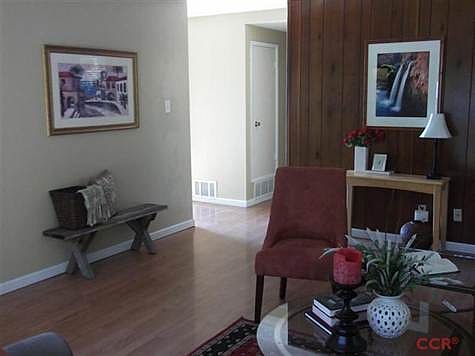 Living room facing entry.