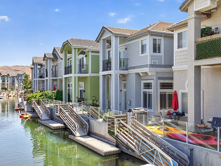 Blue home is:
1128 Harbour Cove Ct.,
Sparks, NV
Includes private dock.