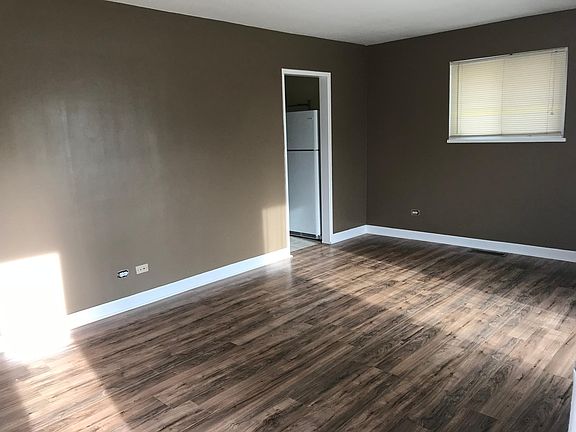 Living room with newly installed floors and paint
