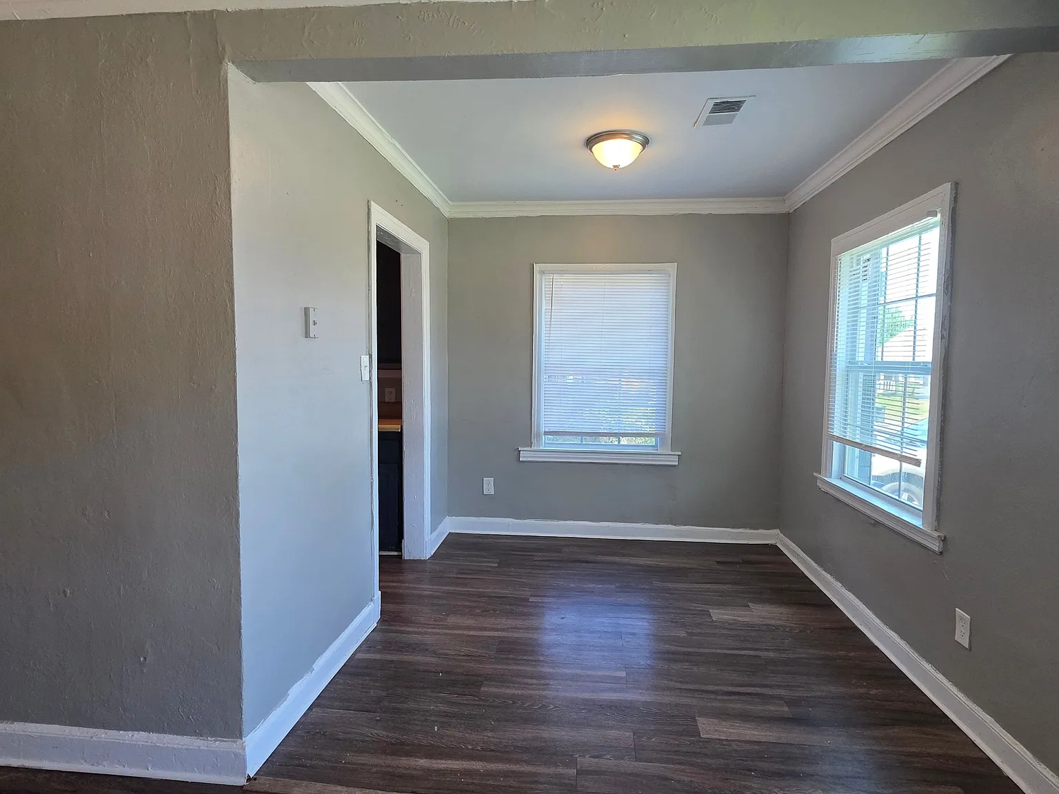 Cozy Duplex Living with Fenced Backyard & Charming Front Porch — Photo 3