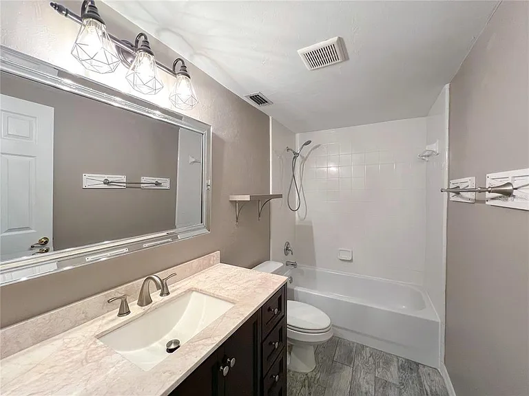 4933 NW 1st Pl #110 — Photo 13