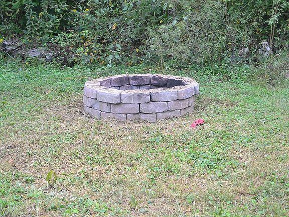 Fire pit near garden area
