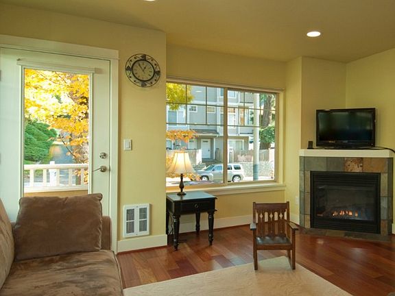 Cozy corner gas fireplace, brazilian cherry floors.