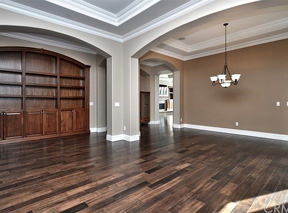 Custom built-ins finish the entry hallway * Notice the handsome hardwood flooring that complete most