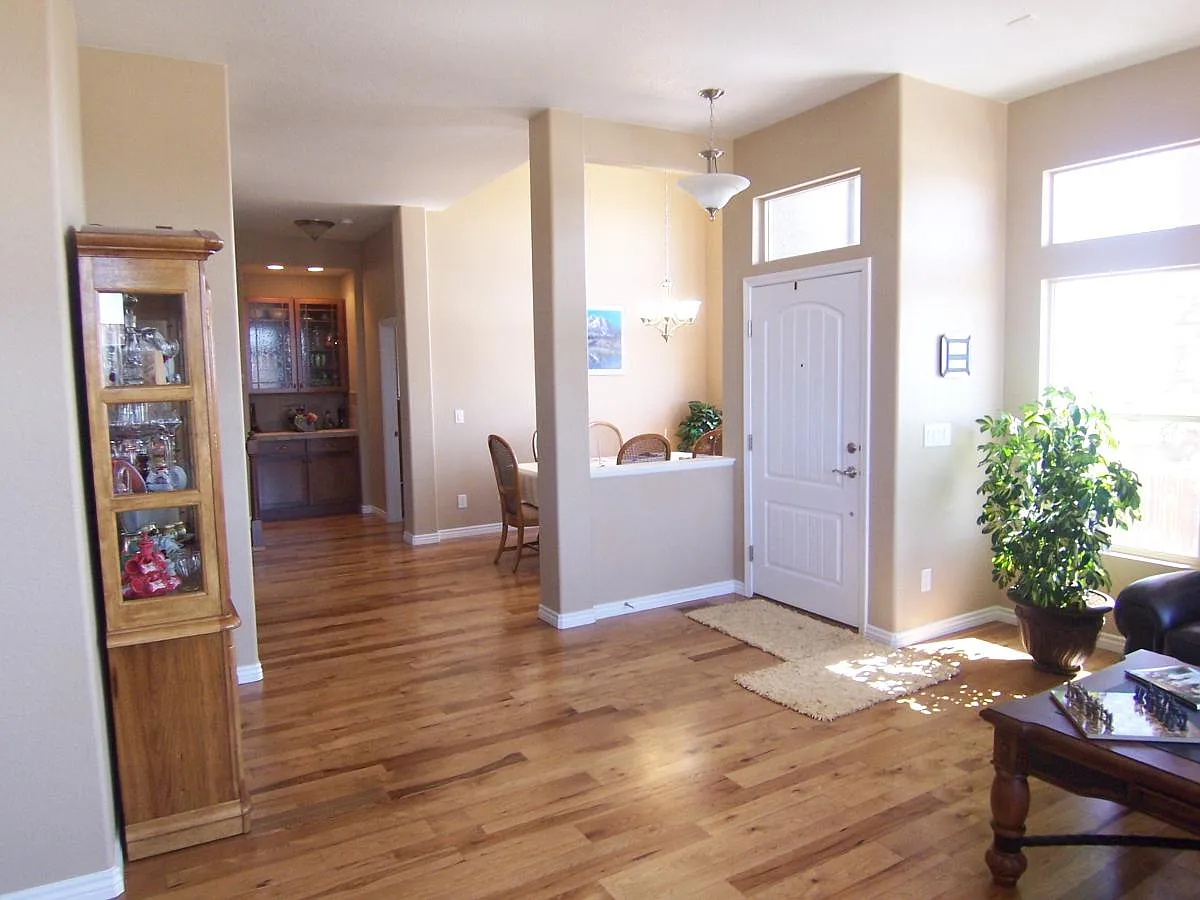 Living room looking towards formal dining - 6310 Wind River Point