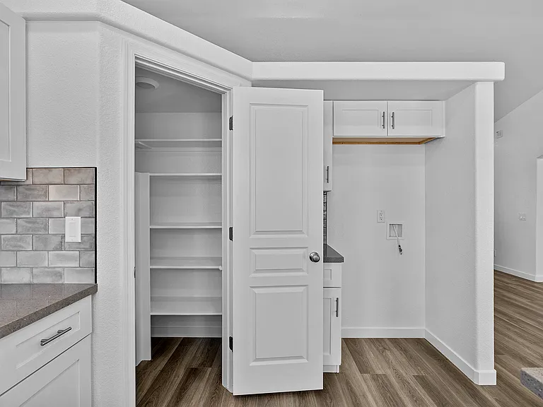 Large pantry and refrigerator hookup.