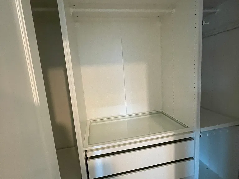 Custom shelving in the Cabinet for organized room