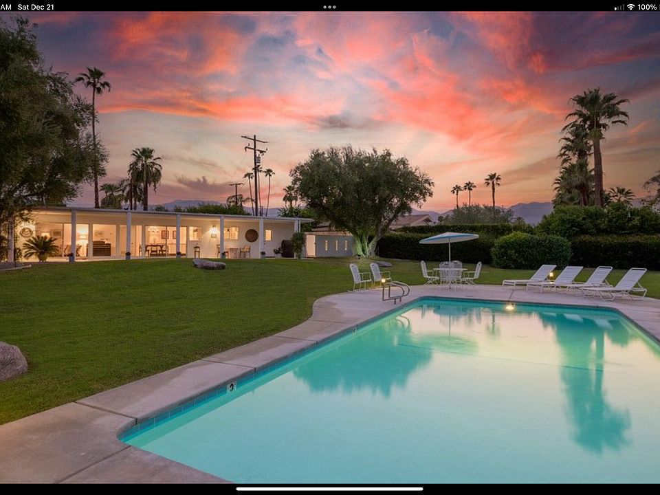 Pool with home in the background