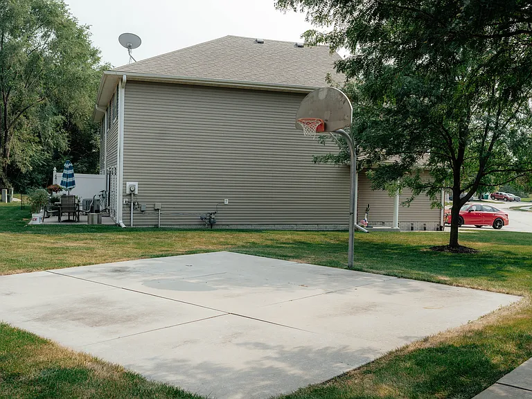 Enjoy shooting hoops in your free time in the neighborhood recreation area.