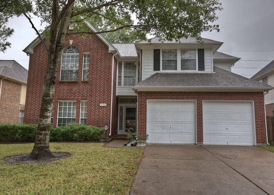 Home with 4 bedrooms, 2.5 bathrooms, and huge gameroom upstairs.