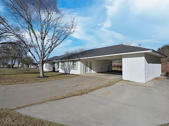 Covered side Parking with Rear Golf Cart Garage