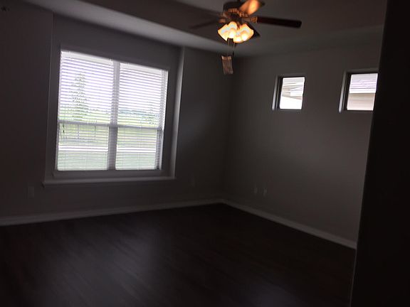 Master bedroom has lots of natural light with 3 small window