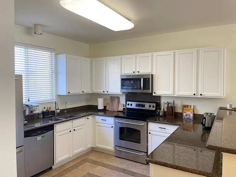 Spacious kitchen with granite countertops