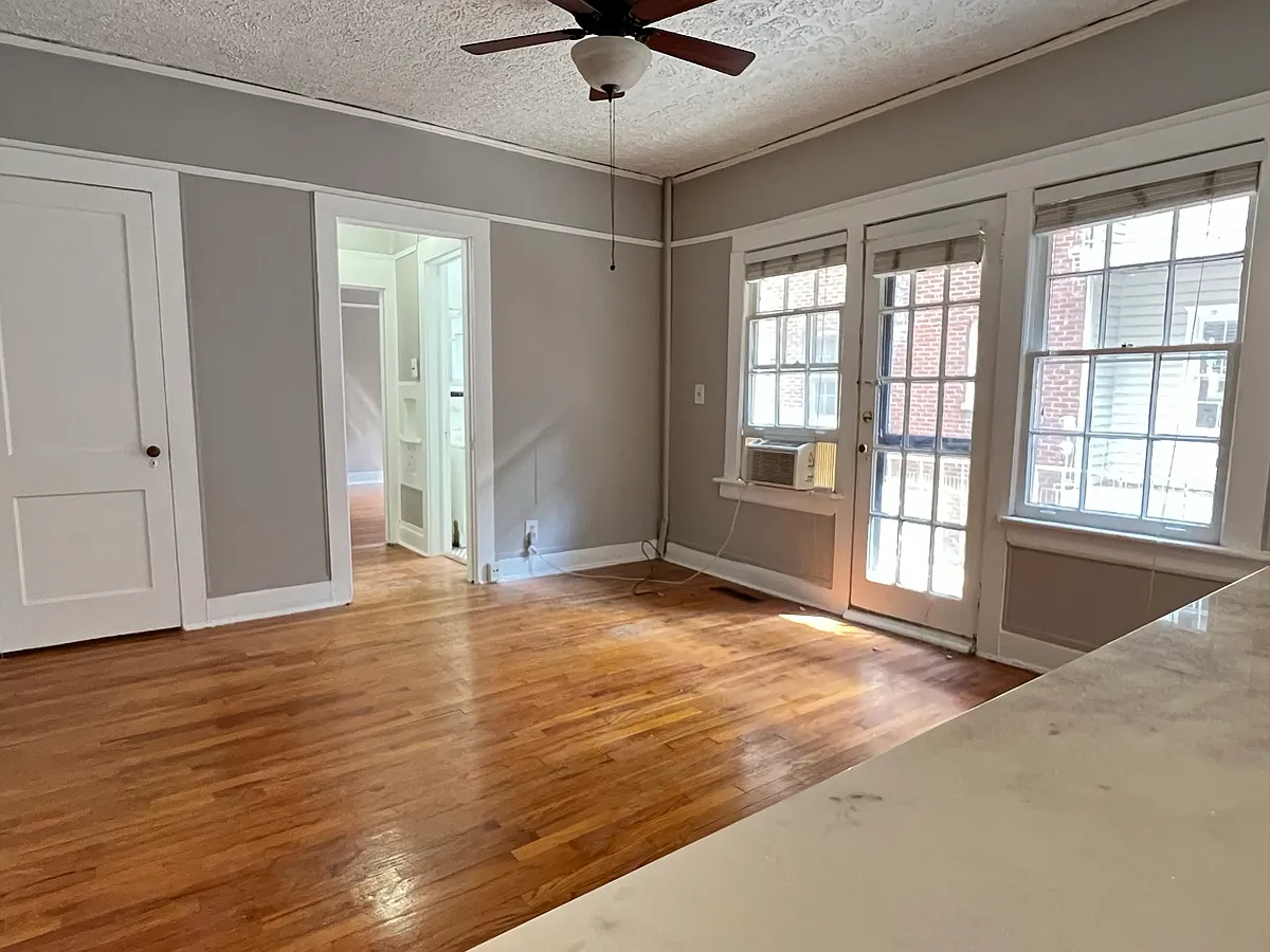 Open floorplan window to kitchen! - 873 Charles Allen Dr NE #7
