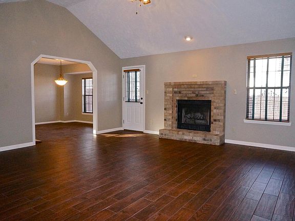 Porcelain flooring is throughout house except baths