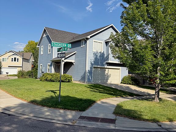 Corner lot with fenced back yard.
