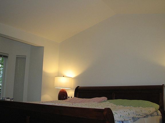 Master bedroom comfortably accommodates king size bed