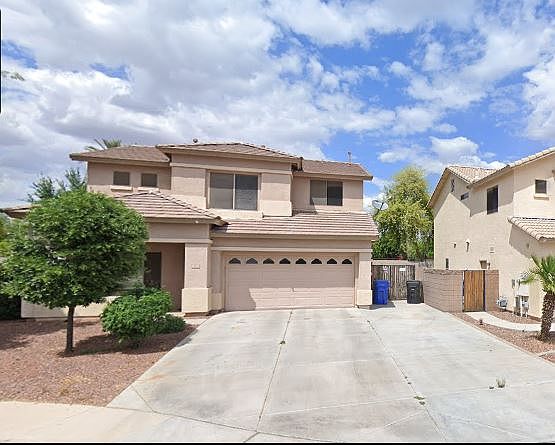 This beautiful spacious home has a large parking area and easy access to the backyard and pool area.