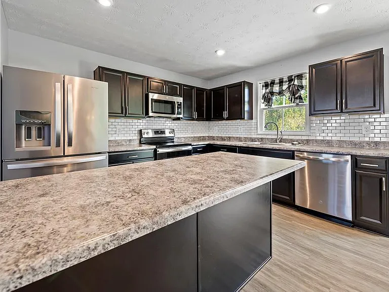 Spacious Island is PERFECT for Baking and Meal Prep or Grab a Quick Bite Before Heading Out the Door.