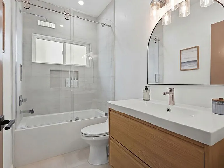Bedroom 2 features full bathroom, large closet, and stunning ocean views.