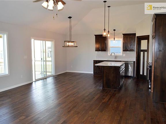 Looking into kitchen from great room.  Plenty of natural lighting.