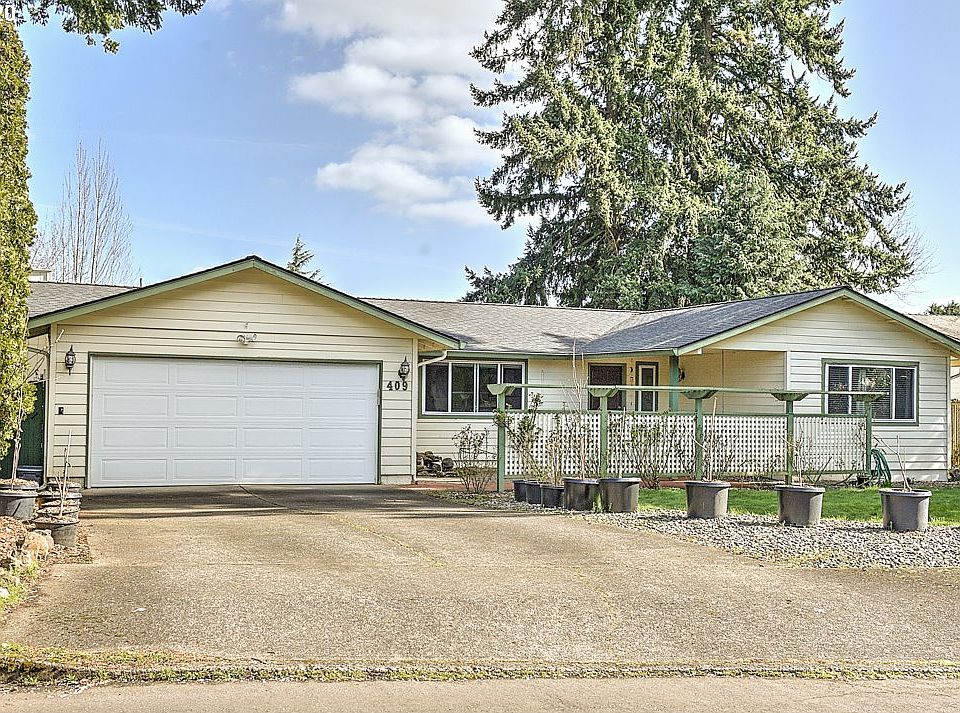 1st image of 409 NE 152nd Ave
