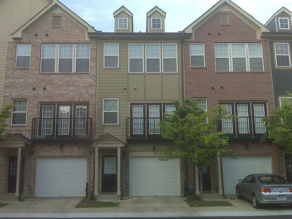 Home with green side is 3783 Ashford Creek Ave