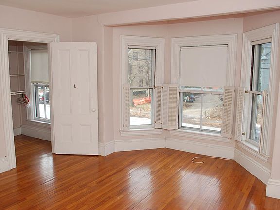Second floor bedroom with bay window. Walk-in closet on left.