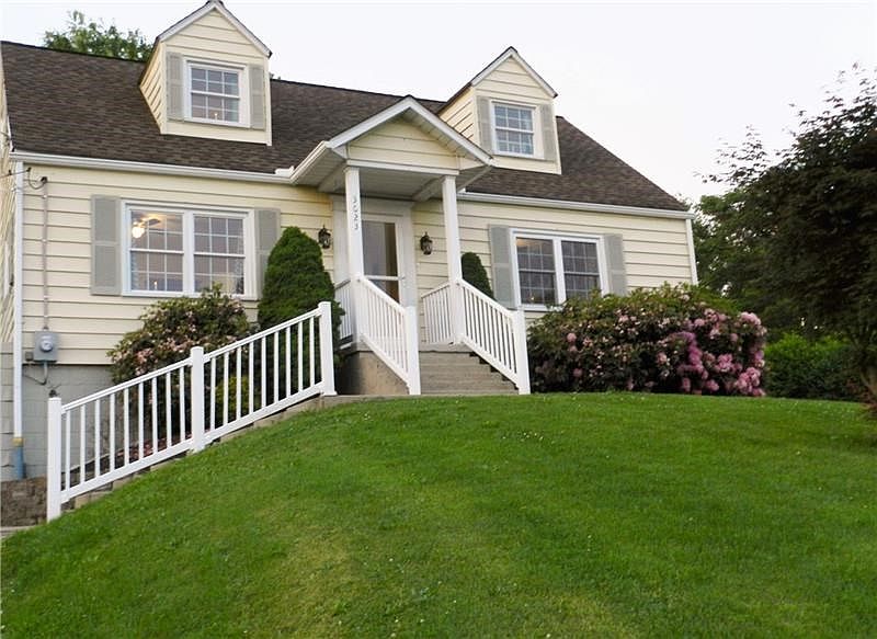 Scenic surroundings embrace this cozy home and property.