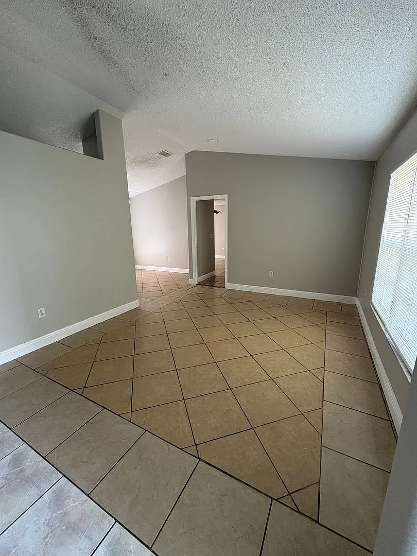 Move-In Ready 3-Bedroom Home in Kissimmee | Tile Floors Throughout & Pet Friendly! — Photo 3