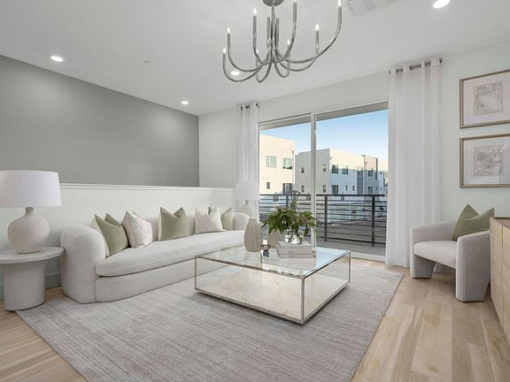 Open main living area with deck access