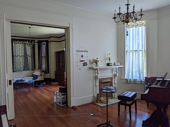 Front dining room through sliding doors into front living room