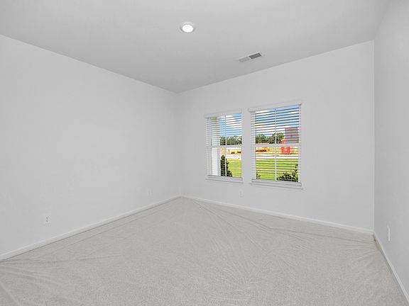 The Chandler floorplan with the Radiant White interior package.