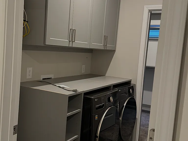 Newly renovated laundry room attached to primary