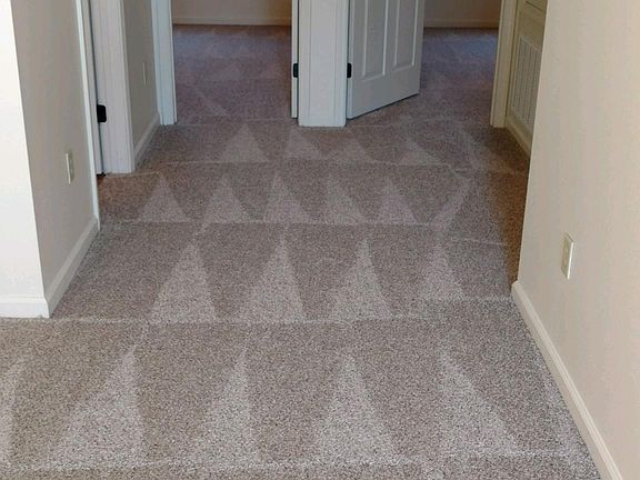 Brand New Mohawk Stain resistant carpet with 8 lb pad.