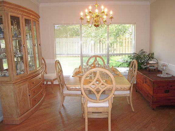 Dining room with wood floors and lots of light!