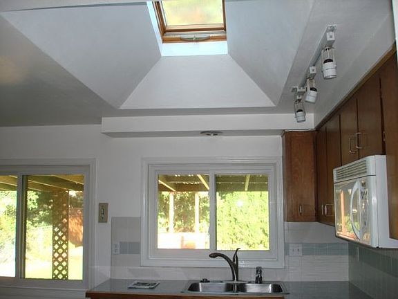 Skylight in kitchen makes it bright and cheery